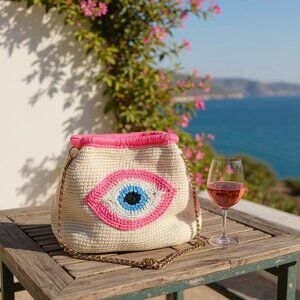 Handmade Pink Crochet Evil Eye Clutch – Boho Chic Collectible Bag